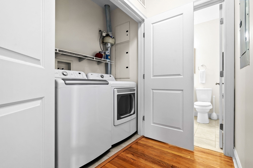 33 Intrepid Circle, Unit 208 Marblehead, MA 01945 - Photo 32 of 35 a kitchen with stainless steel appliances a refrigerator and a stove