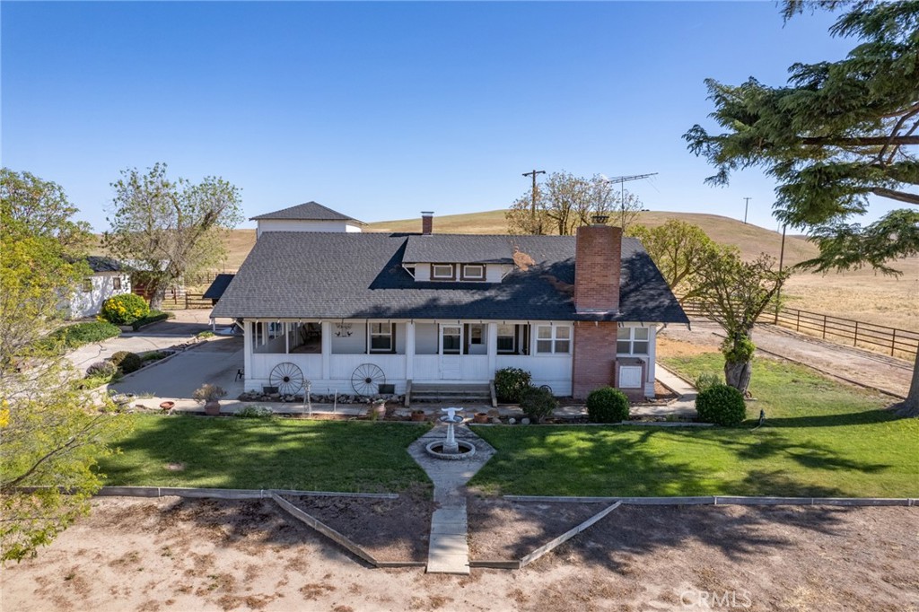 2500 Shandon Shandon, CA 93461 - Photo 28 of 40 a front view of a house with a garden and plants