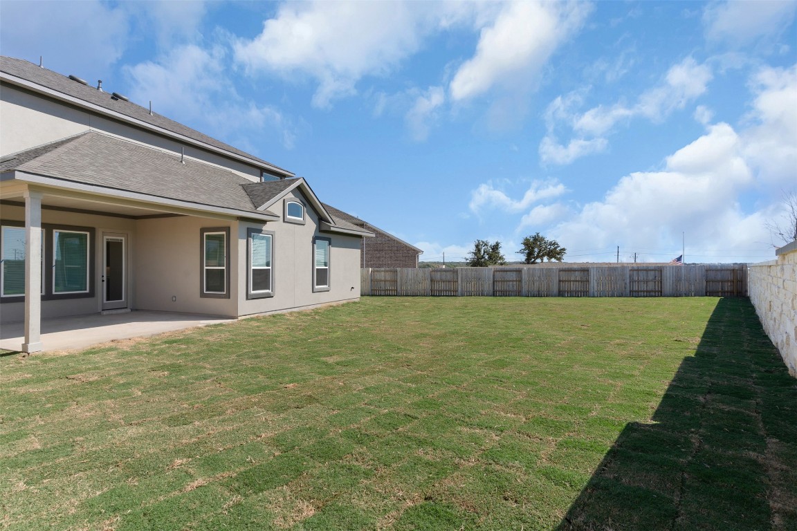 101 Golden Sage Avenue Georgetown, TX 78633 - Photo 18 of 24 Fenced backyard featuring a patio