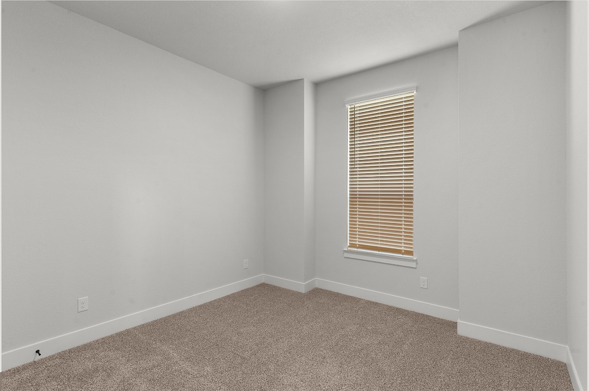 101 Golden Sage Avenue Georgetown, TX 78633 - Photo 10 of 24 an empty room with a window