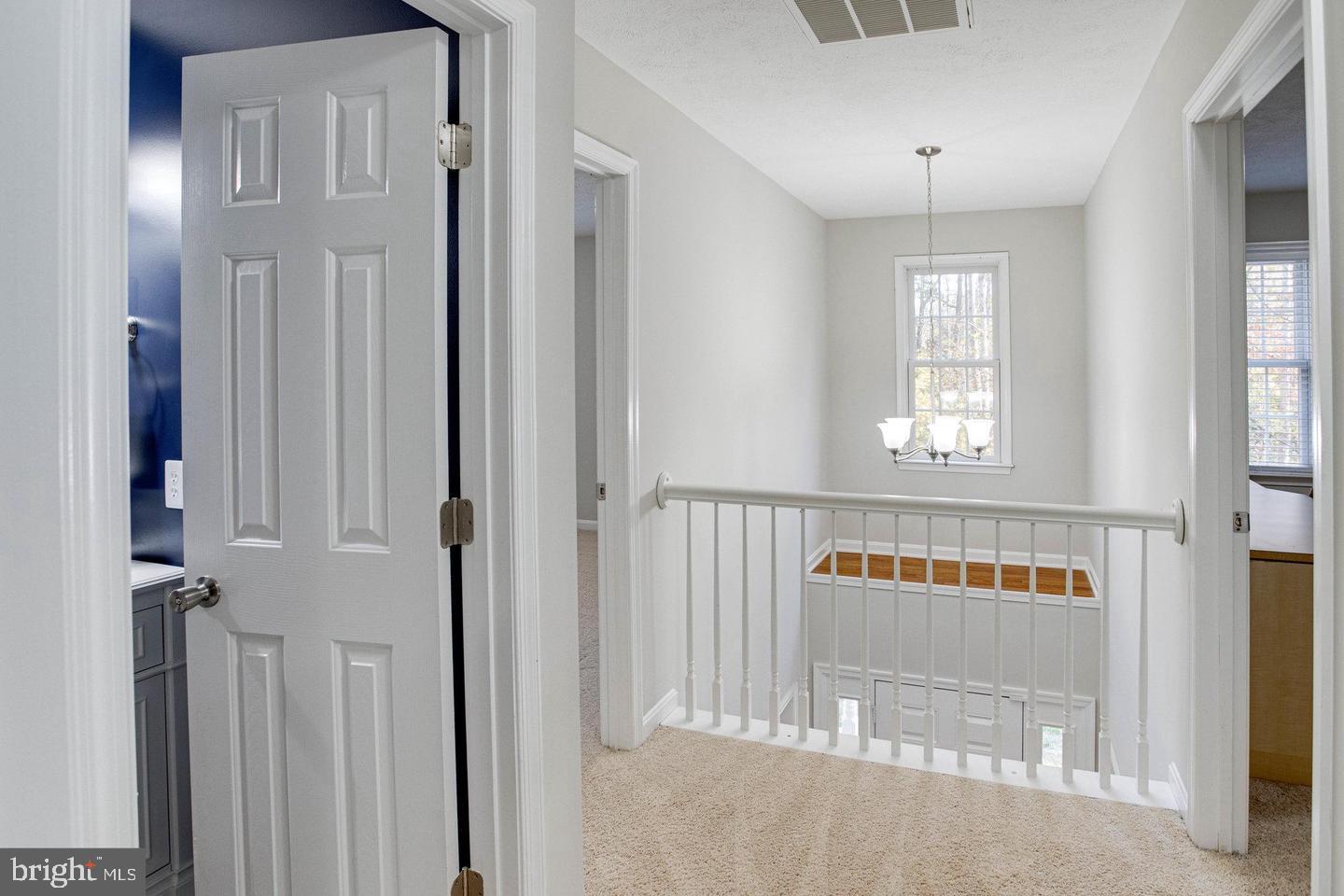 6316 Hams Ford Road Spotsylvania, VA 22551 - Photo 14 of 21 a view of a hallway with windows and entryway