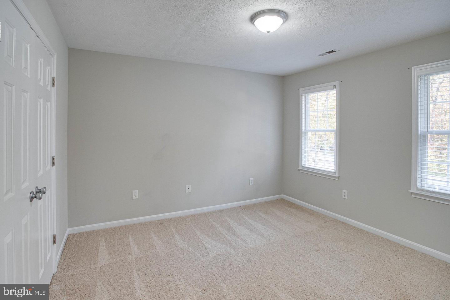 6316 Hams Ford Road Spotsylvania, VA 22551 - Photo 15 of 21 an empty room with windows