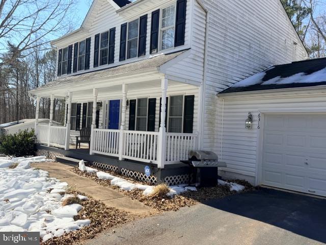 6316 Hams Ford Road Spotsylvania, VA 22551 - Photo 2 of 21 a view of a house with a small yard and wooden floor and fence