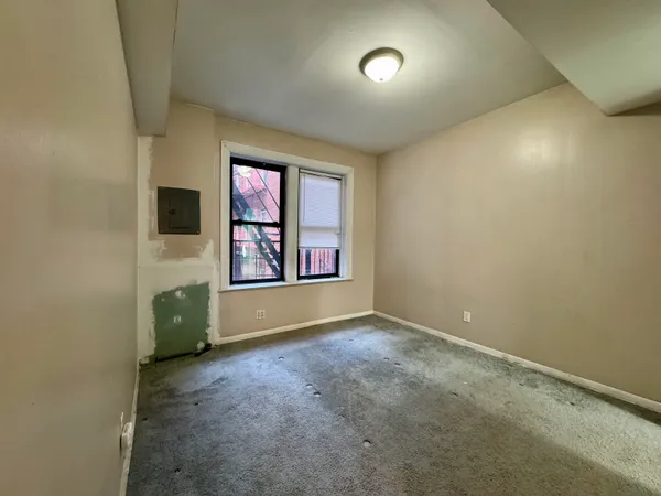an empty room with windows