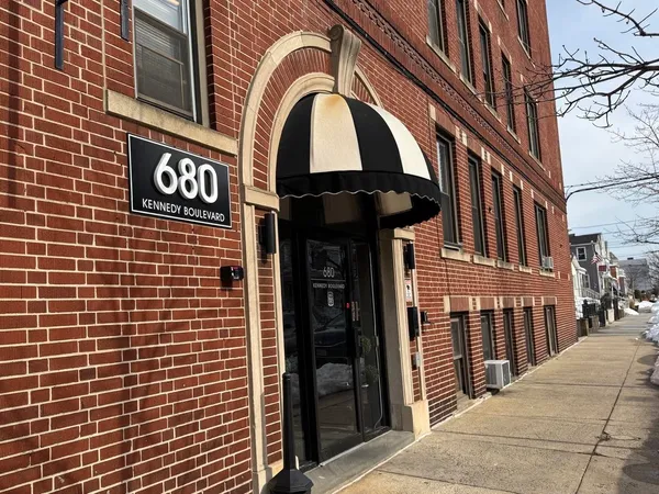 a view of a brick building with a door