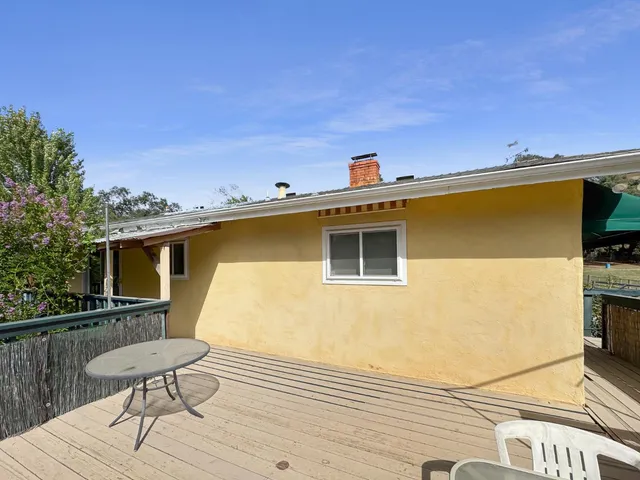 a view of a backyard with a garden
