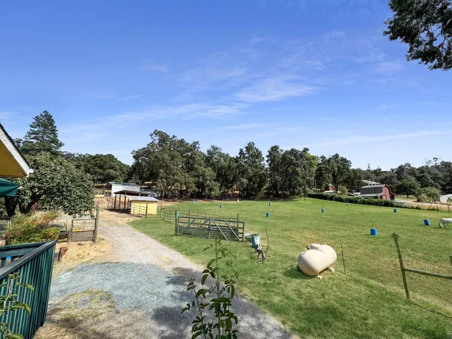 a stove top oven sitting inside of a kitchen