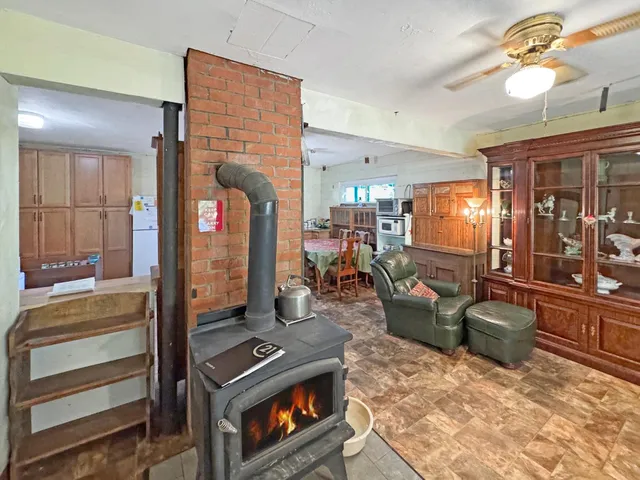 a bathroom with a sink vanity mirror and toilet