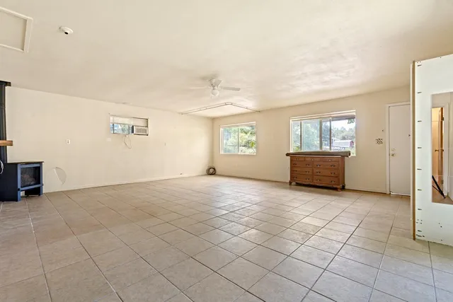 a front view of a house with a glass door