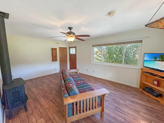 a kitchen with stainless steel appliances wooden cabinets and a sink
