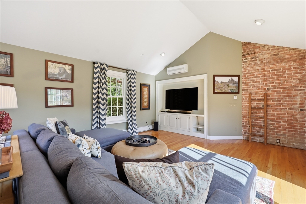 123 Englewood Road Longmeadow, MA 01106 - Photo 12 of 42 a living room with furniture and a flat screen tv