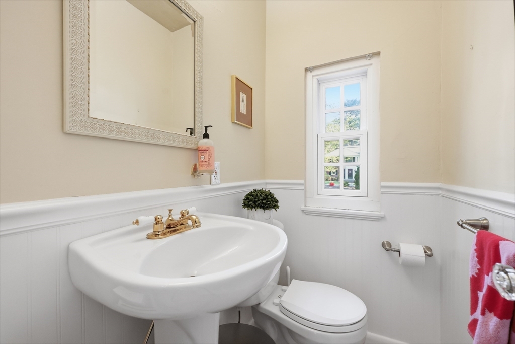 123 Englewood Road Longmeadow, MA 01106 - Photo 16 of 42 a bathroom with a sink a toilet and mirror