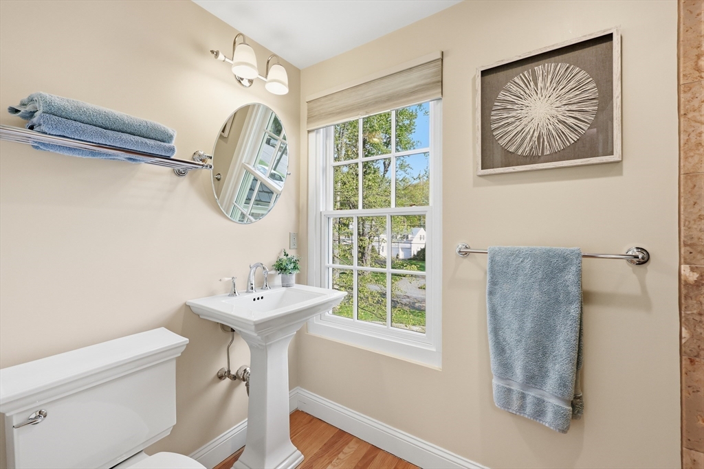 123 Englewood Road Longmeadow, MA 01106 - Photo 24 of 42 a bathroom with a sink and a mirror