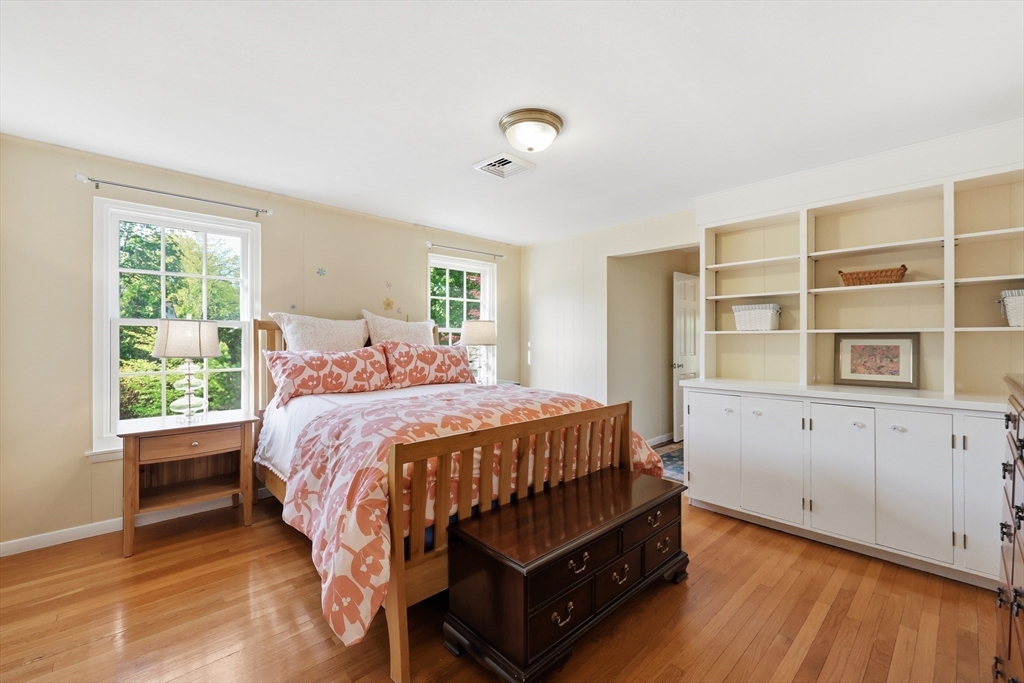 123 Englewood Road Longmeadow, MA 01106 - Photo 26 of 42 a bed sitting in a spacious bedroom next to a window