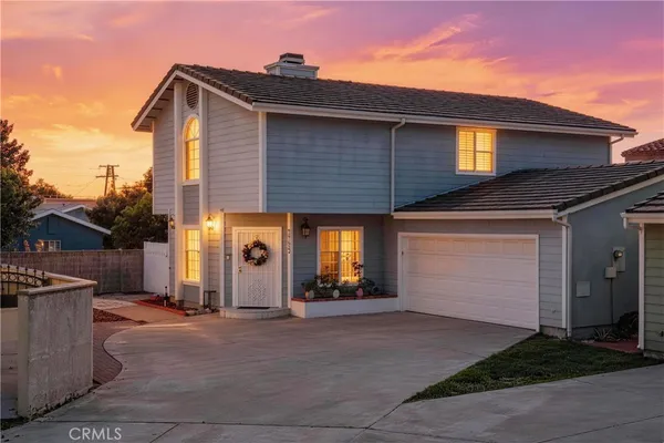 a view of a house with a garage