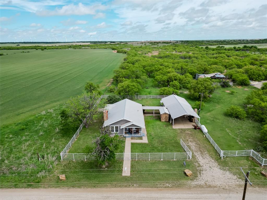 794 West Antelope Road, Unit 1 Windthorst, TX 76389 - Photo 21 of 40 a view of a garden with an ocean