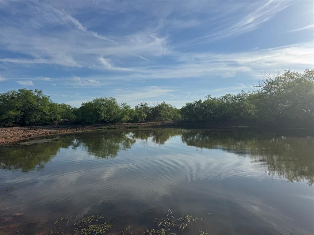794 West Antelope Road, Unit 1 Windthorst, TX 76389 - Photo 31 of 40 a view of a lake with houses in the back