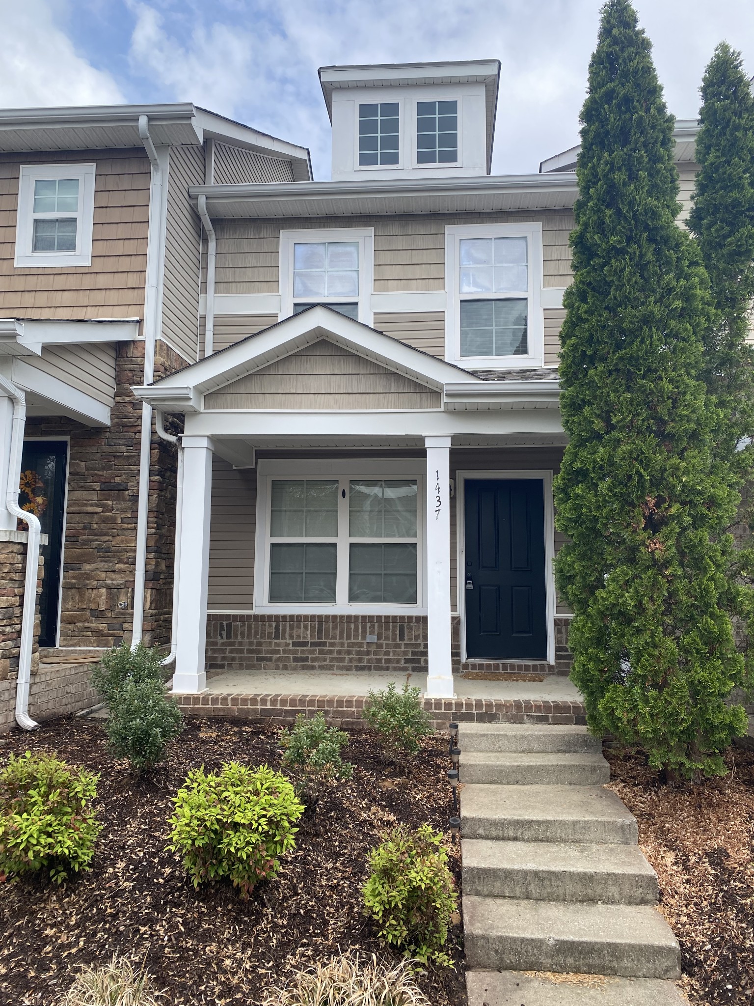 1437 Riverbrook Drive Hermitage, TN 37076 - Photo 1 of 16 a front view of a house