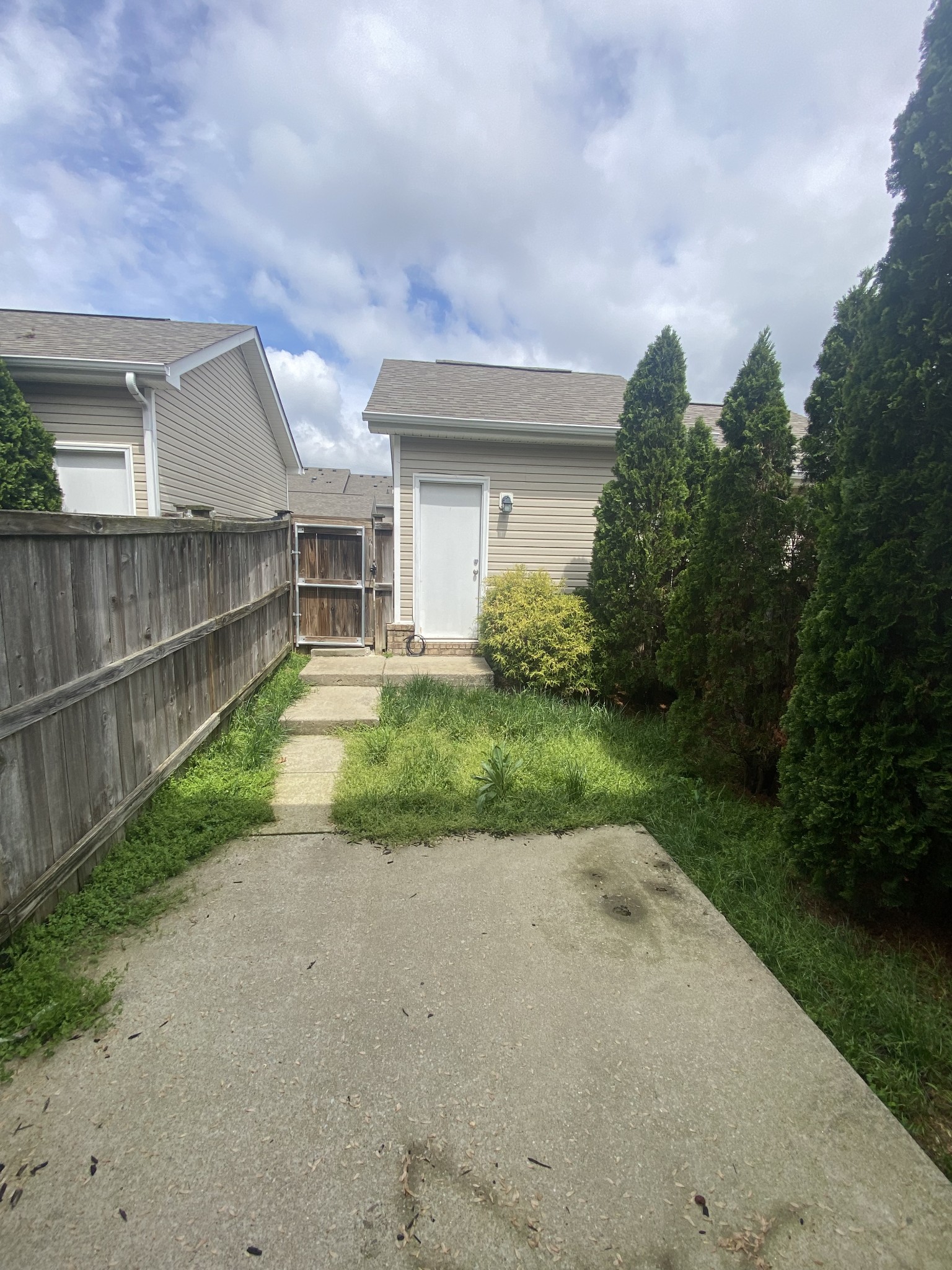 1437 Riverbrook Drive Hermitage, TN 37076 - Photo 16 of 16 a view of a backyard of the house