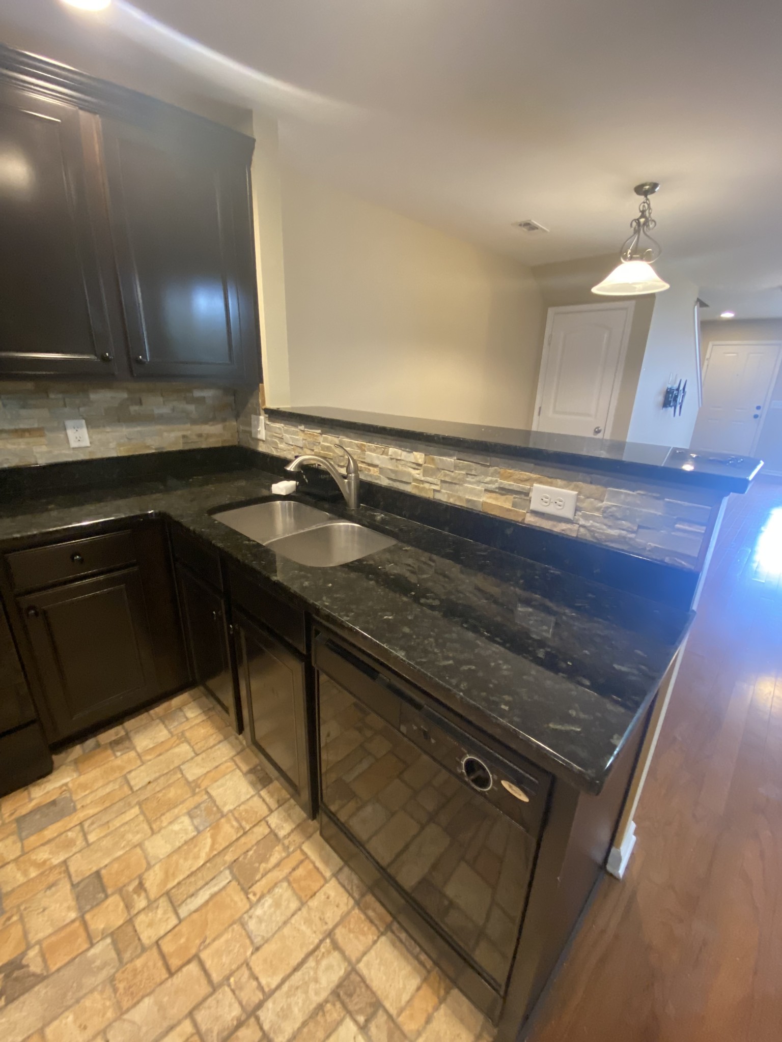 1437 Riverbrook Drive Hermitage, TN 37076 - Photo 8 of 16 a kitchen with a sink a stove and cabinets