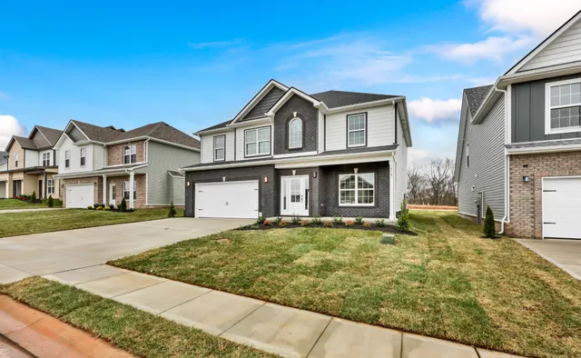 a view of a big house with many windows