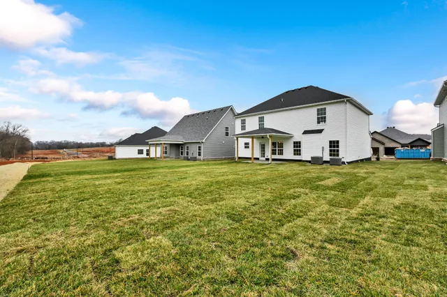 a view of a house with a big yard