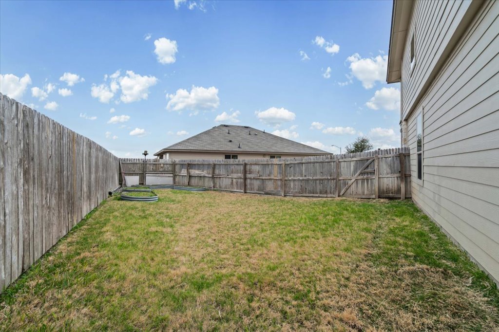 212 Plata Lane Jarrell, TX 76537 - Photo 26 of 30 View of fenced backyard