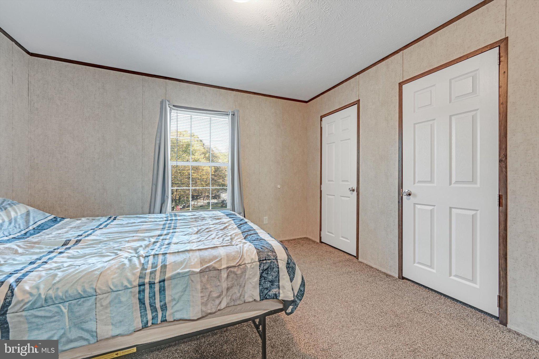 38 Squaw Circle Barto, PA 19504 - Photo 15 of 26 a bedroom with a bed and a window
