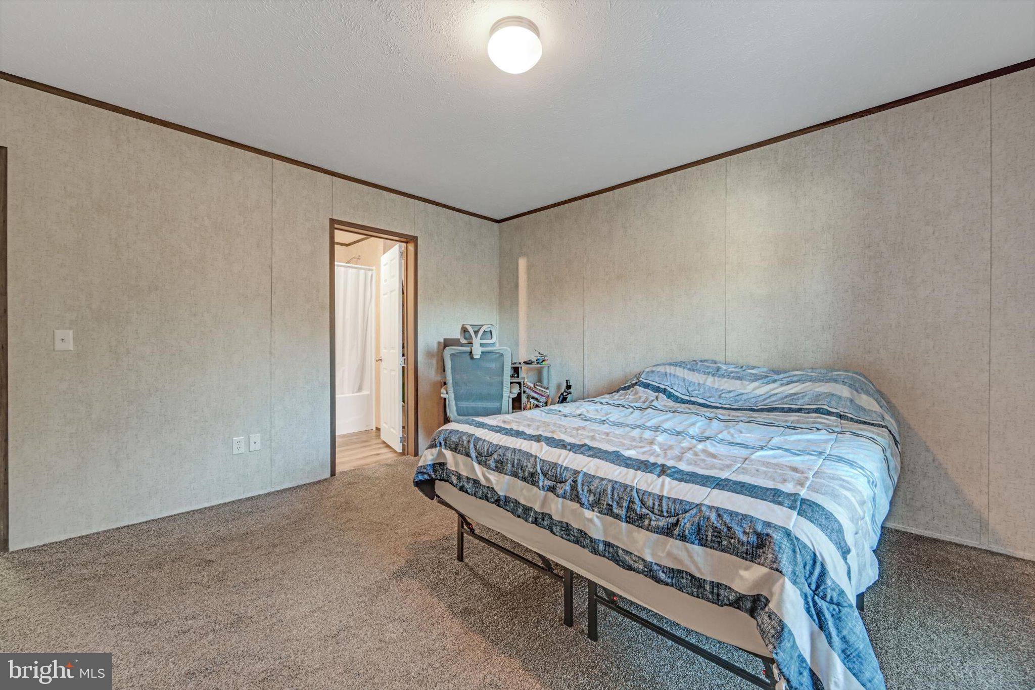 38 Squaw Circle Barto, PA 19504 - Photo 16 of 26 a bedroom with a bed and a window