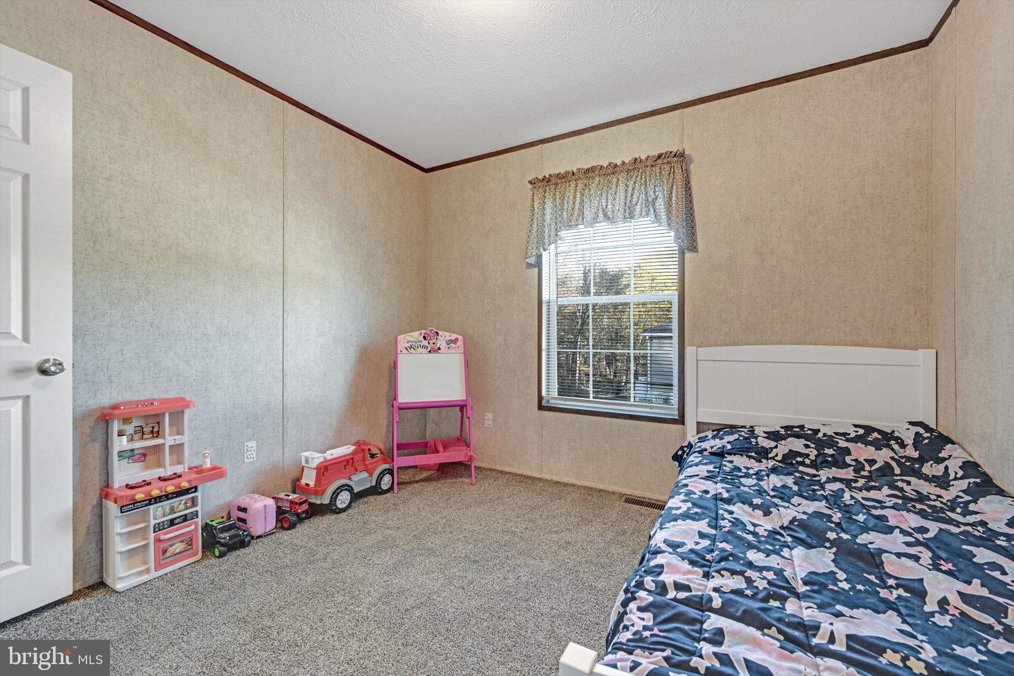 38 Squaw Circle Barto, PA 19504 - Photo 19 of 26 a bedroom with a bed and a window