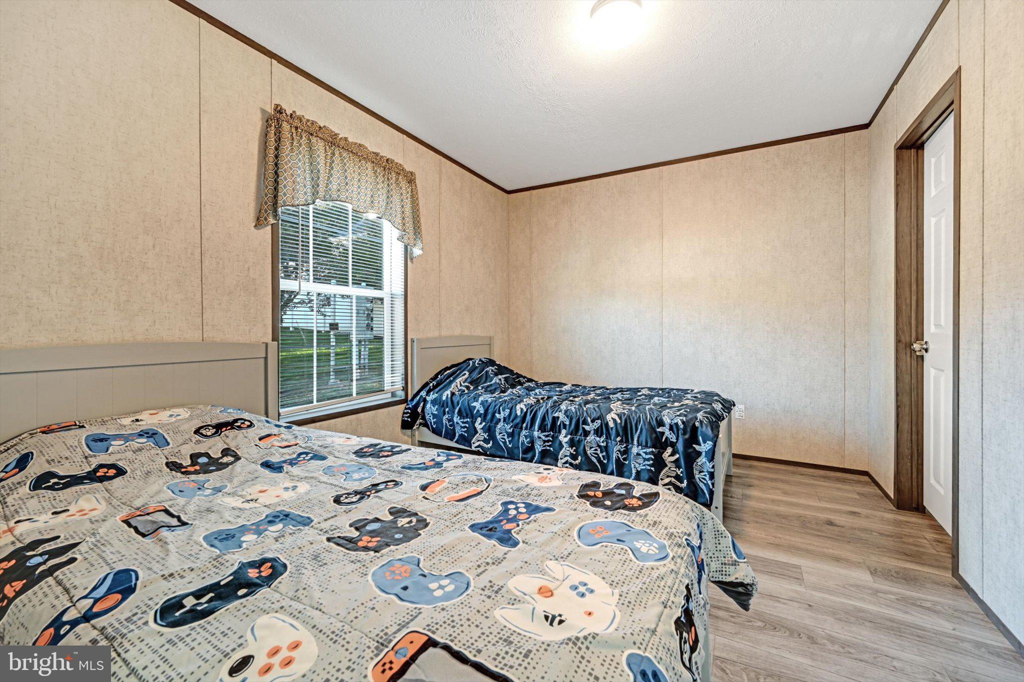 38 Squaw Circle Barto, PA 19504 - Photo 20 of 26 a bedroom with a bed and wooden floor