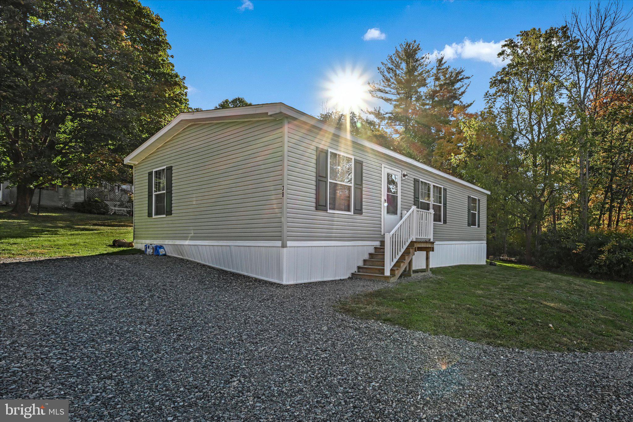 38 Squaw Circle Barto, PA 19504 - Photo 2 of 26 a view of a house with backyard and trees