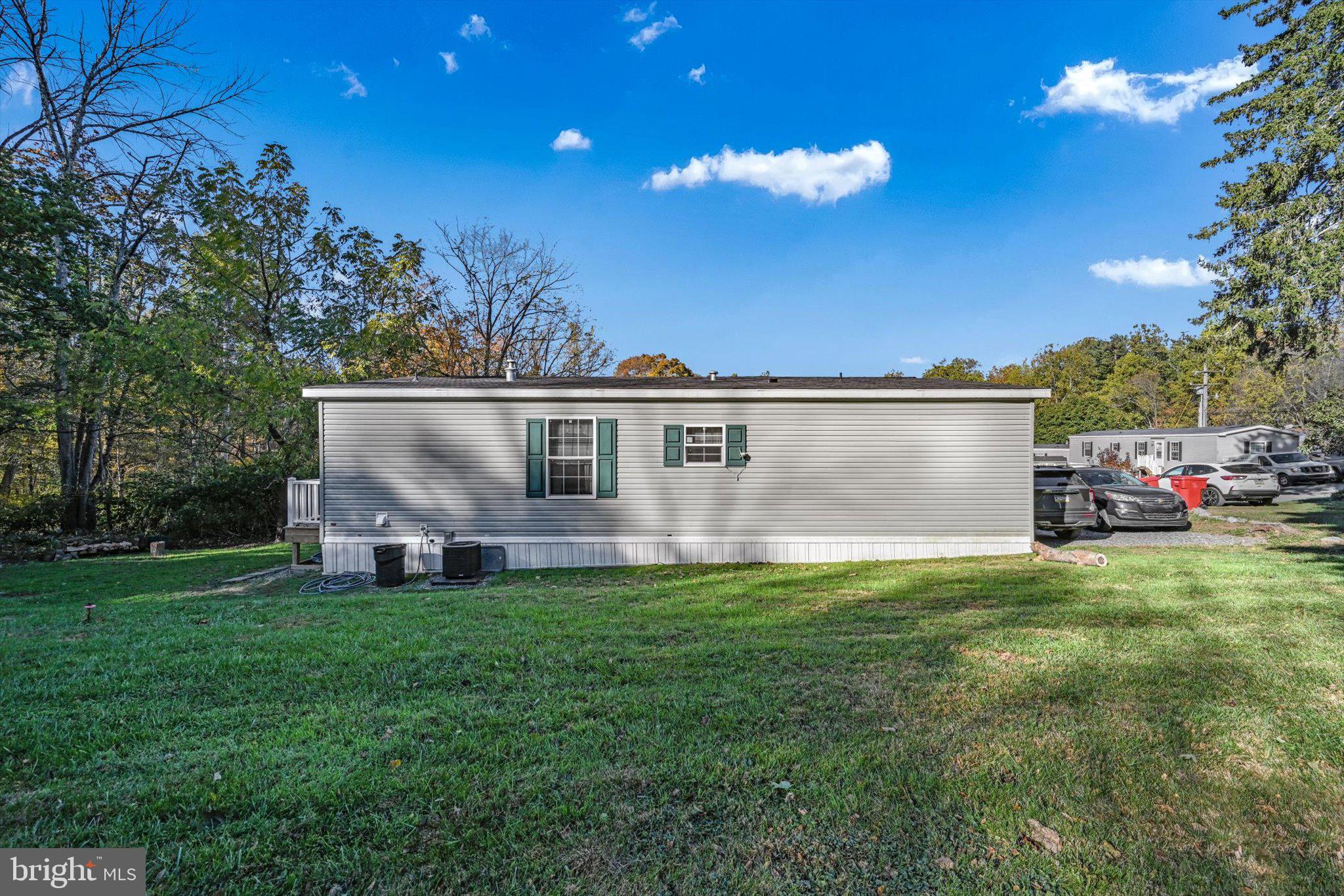 38 Squaw Circle Barto, PA 19504 - Photo 26 of 26 a view of a house with a big yard and a large tree