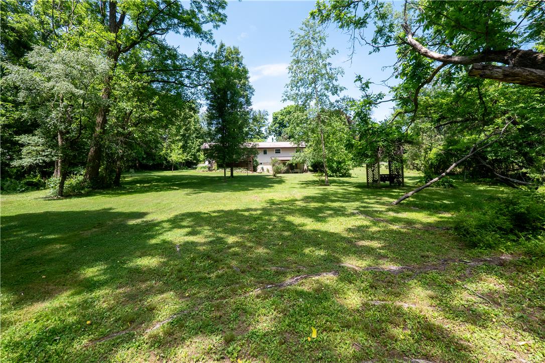 5311 Macungie Mountain Road Macungie, PA 18062 - Photo 47 of 56 A spacious, naturally illuminated yard offers verdant grounds and a private, treed setting.