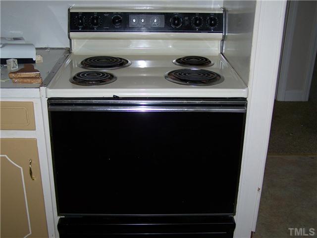 56 Mill Creek Road Roxboro, NC 27574 - Photo 19 of 23 Stove in the kitchen
