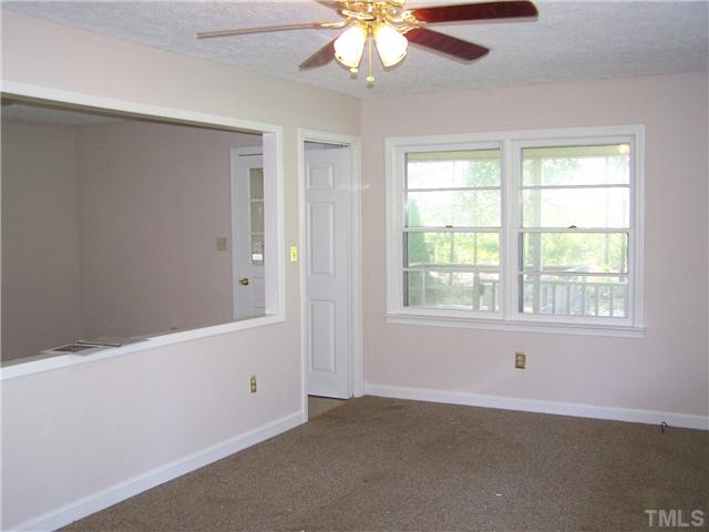 56 Mill Creek Road Roxboro, NC 27574 - Photo 3 of 23 Living room with new paint