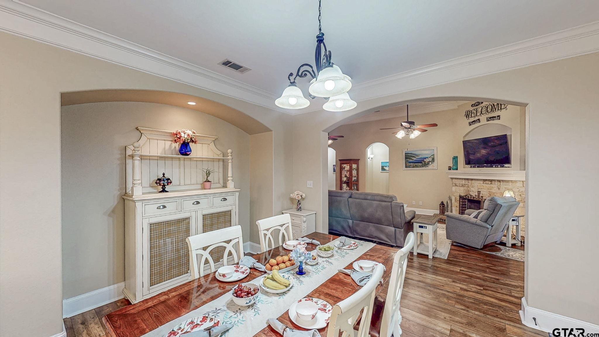 18488 Bluebird Circle Flint, TX 75762 - Photo 9 of 47 a view of a dining room with furniture and wooden floor