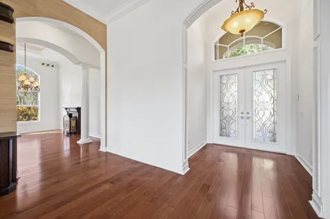 a view of kitchen with furniture and flat screen tv