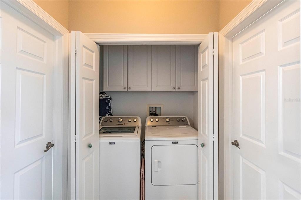 2002 Bal Harbor Boulevard, Unit 1022 Punta Gorda, FL 33950 - Photo 19 of 32 a view of storage and utility room with washer and dryer