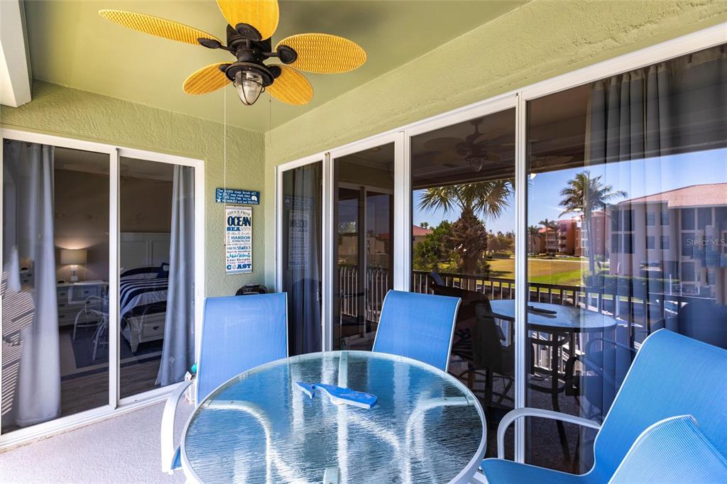 2002 Bal Harbor Boulevard, Unit 1022 Punta Gorda, FL 33950 - Photo 20 of 32 a view of a dining room with furniture window and outside view