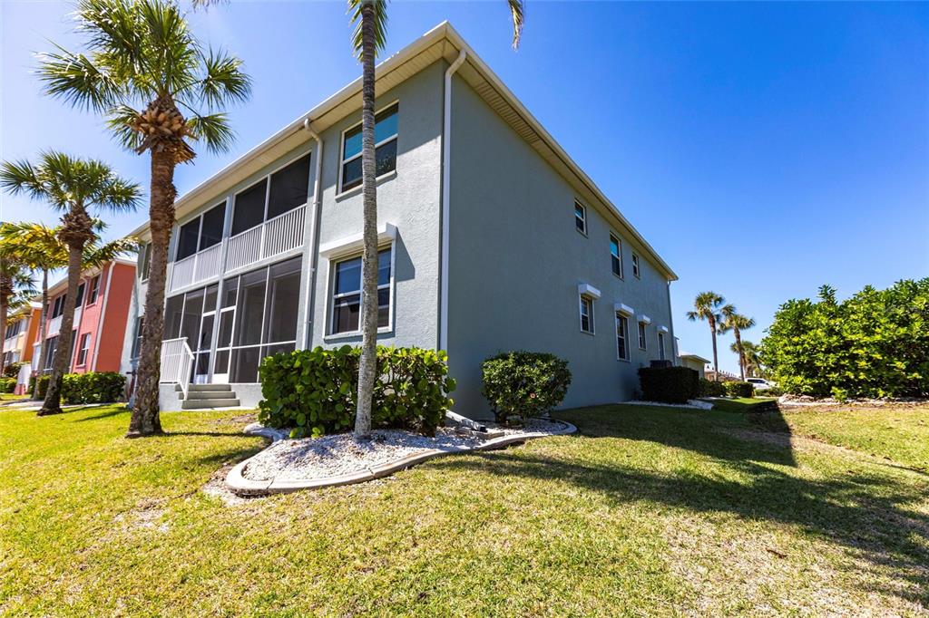 2002 Bal Harbor Boulevard, Unit 1022 Punta Gorda, FL 33950 - Photo 25 of 32 a view of a house with swimming pool