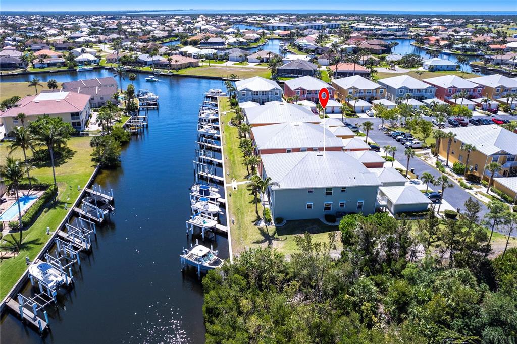 2002 Bal Harbor Boulevard, Unit 1022 Punta Gorda, FL 33950 - Photo 28 of 32 an aerial view of residential houses with outdoor space