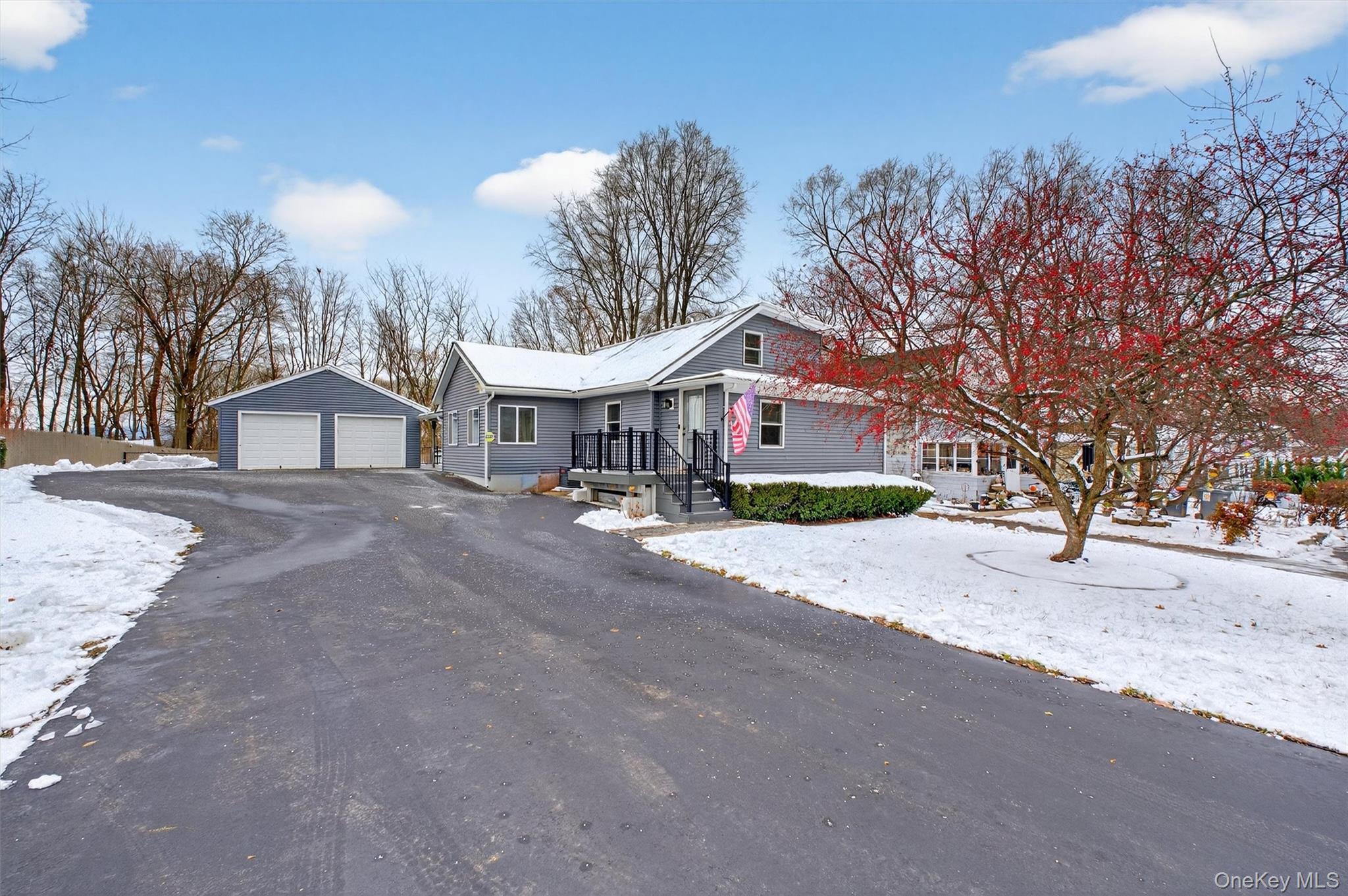 a view of a house with a street