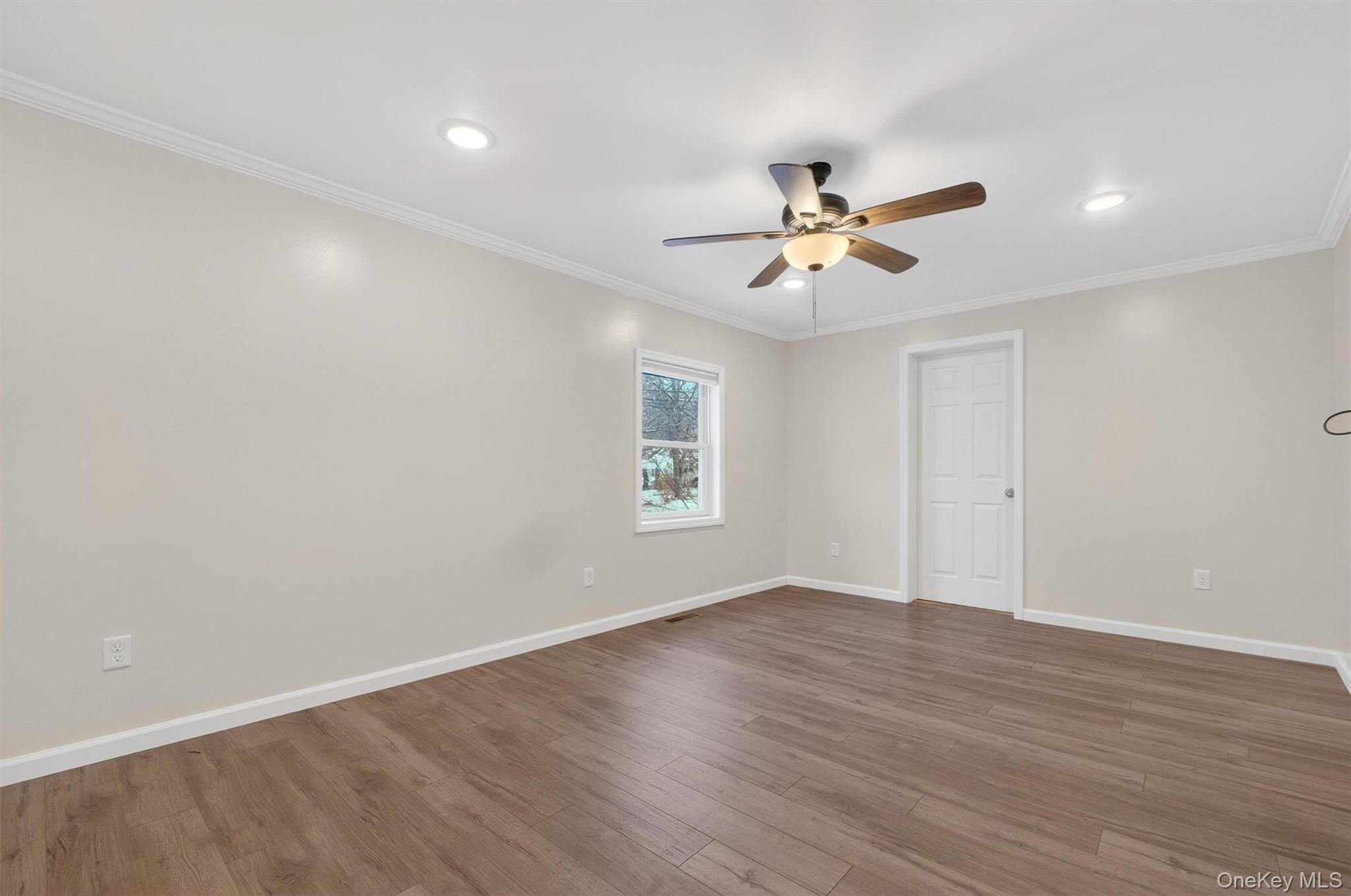 173 North Grand Avenue Poughkeepsie, NY 12603 - Photo 15 of 33 wooden floor in an empty room with a window