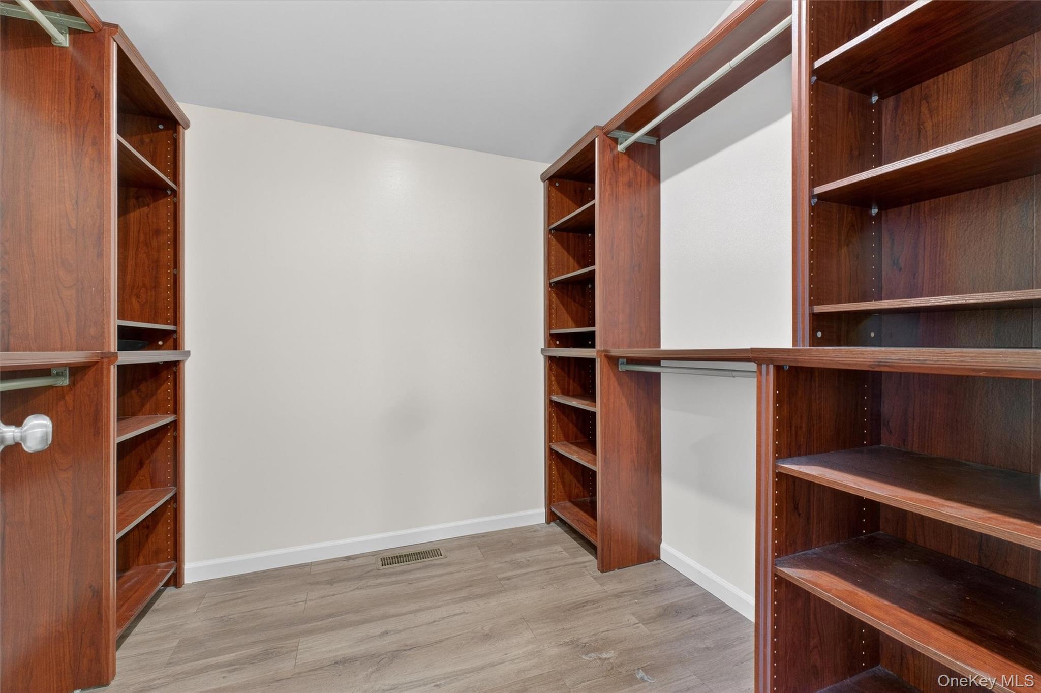 173 North Grand Avenue Poughkeepsie, NY 12603 - Photo 19 of 33 a view of walk in closet with empty racks
