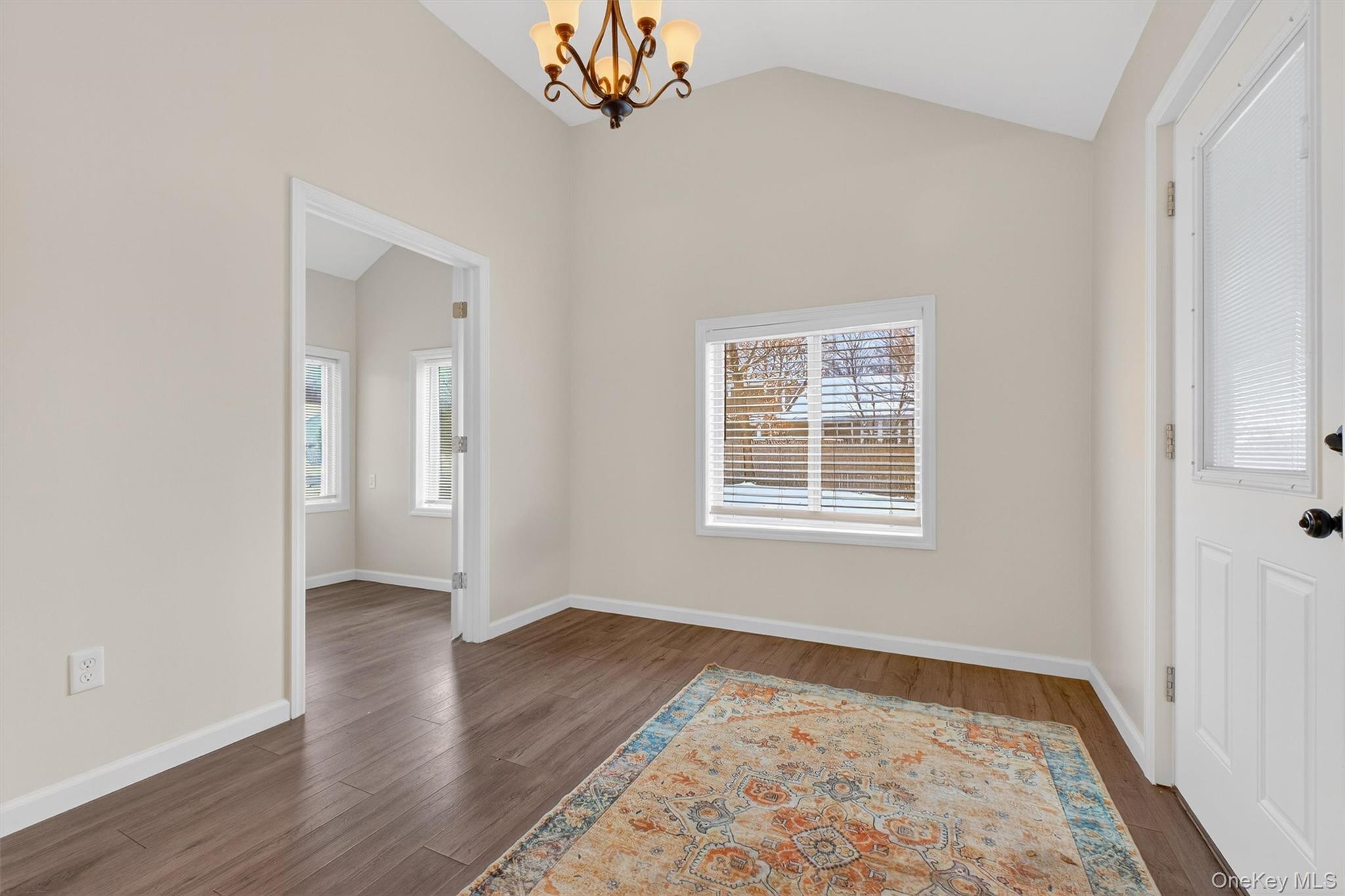 173 North Grand Avenue Poughkeepsie, NY 12603 - Photo 22 of 33 a view of an empty room with wooden floor and a window