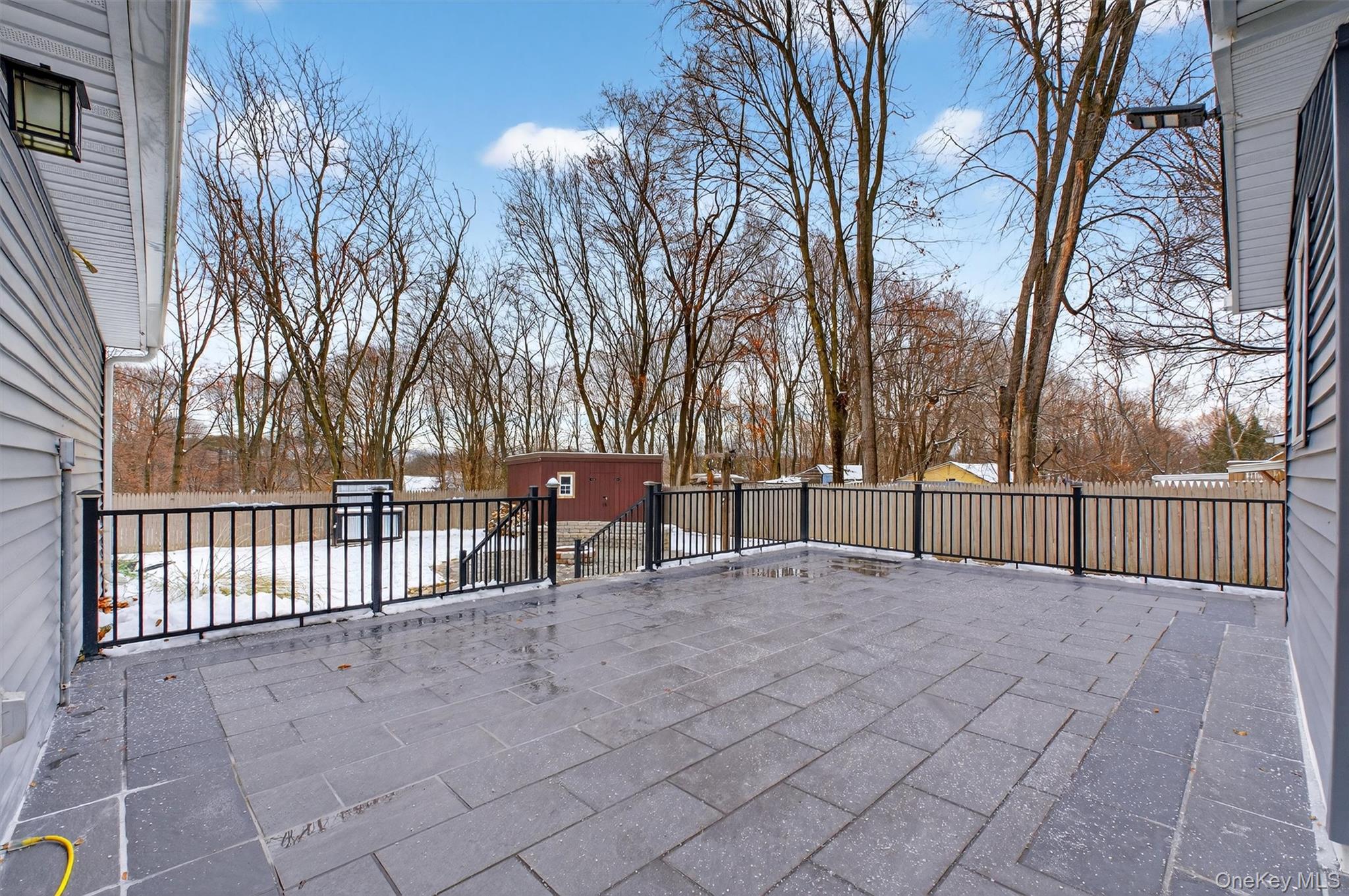 173 North Grand Avenue Poughkeepsie, NY 12603 - Photo 27 of 33 a view of backyard with a large trees and wooden fence