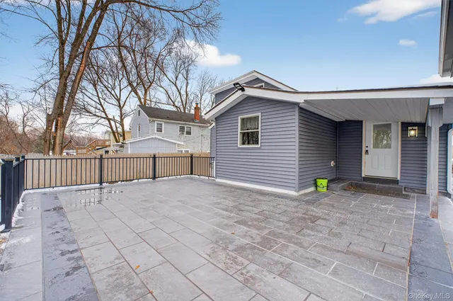 a front view of a house with a garage