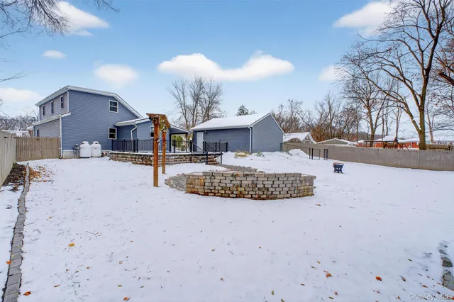 a view of a house with a snow