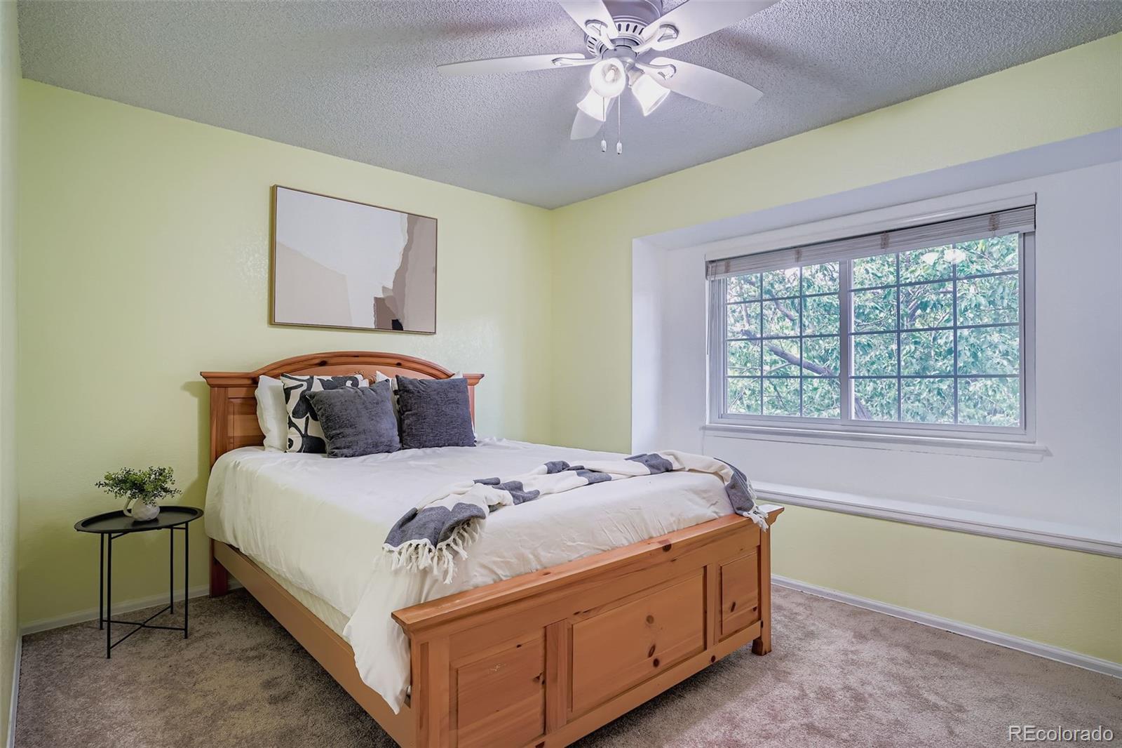 202 Northridge Road Highlands Ranch, CO 80126 - Photo 26 of 37 a bedroom with a bed and window